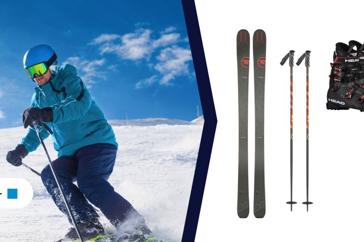 a person skiing down a snow covered slope